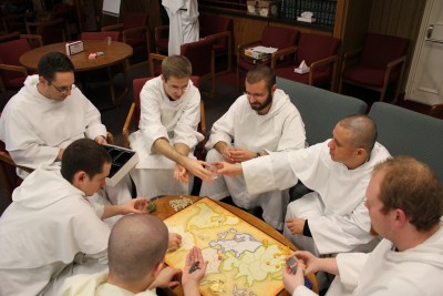 Dominicans Playing a Board Game